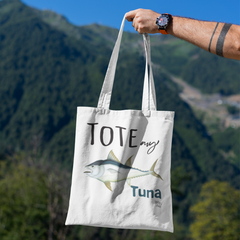 mockup-featuring-a-man-s-hand-holding-a-tote-bag-against-a-natural-scenery-3131-el1 (1)