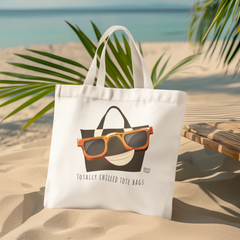 mockup-of-an-ai-generated-sublimated-tote-bag-placed-on-the-sand-m40696